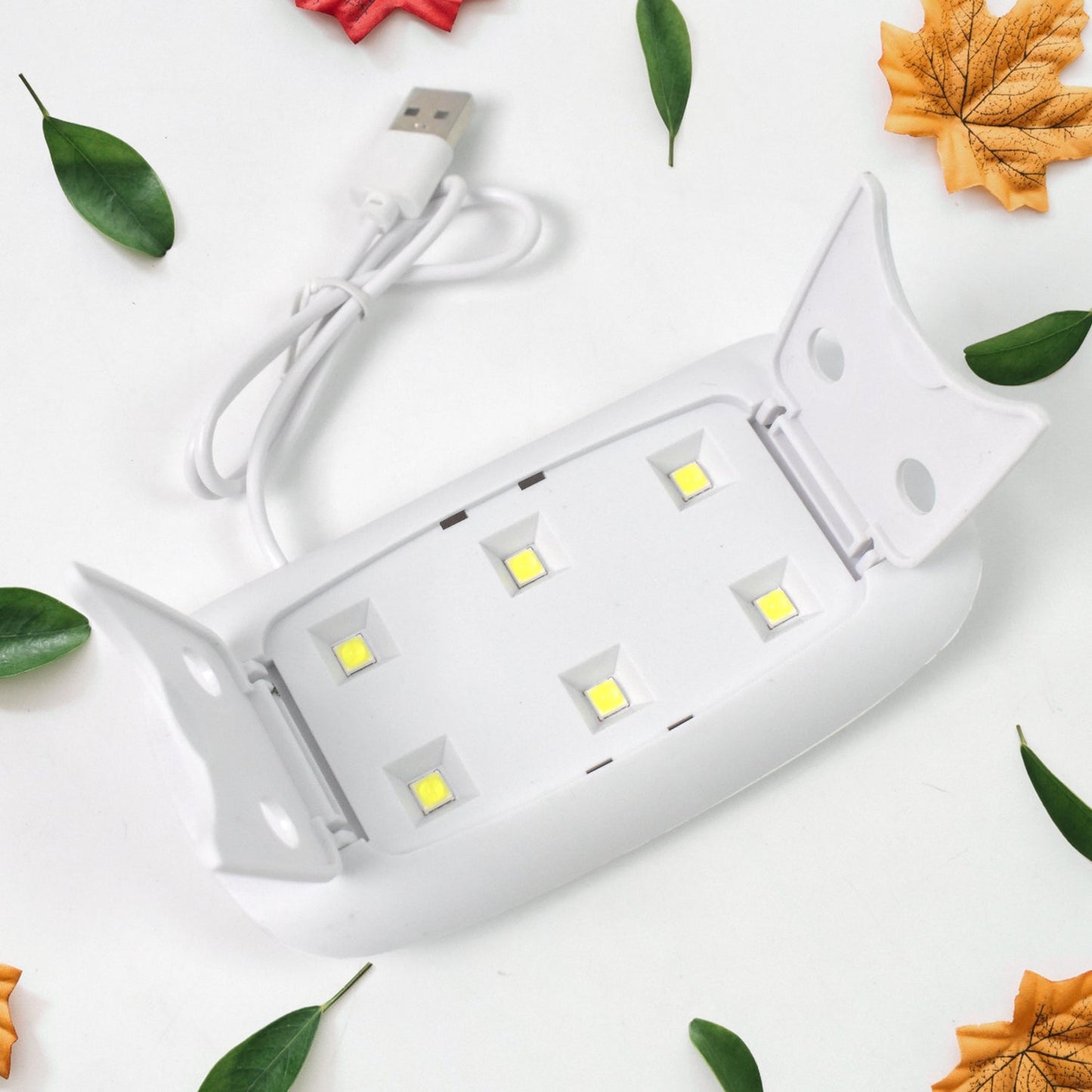 Mini UV LED Nail Dryer Lamp – Portable Gel Nail Light with Timer (1 Pc)
